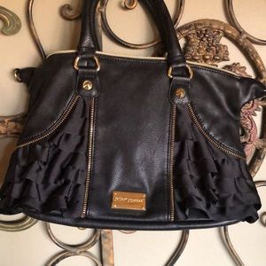 Lovely Betsey Johnson purse with gorgeous ribbon.